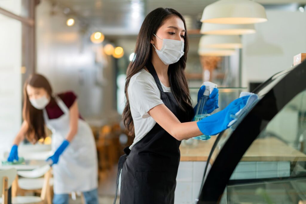 NuoBello Hospitality Outsourcing - Hotel Staffing - Spraying Detergent Alcohol Safe Clean